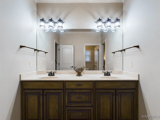 8513 Rockbridge Cir, Montgomery, AL 36116 - bathroom with double vanity and ornamental molding