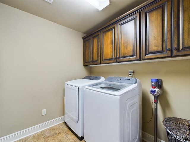 8513 Rockbridge Cir, Montgomery, AL 36116 - washroom with cabinet space, washing machine and clothes dryer, and baseboards