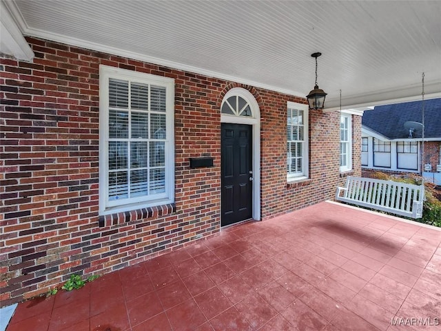 view of patio featuring a porch