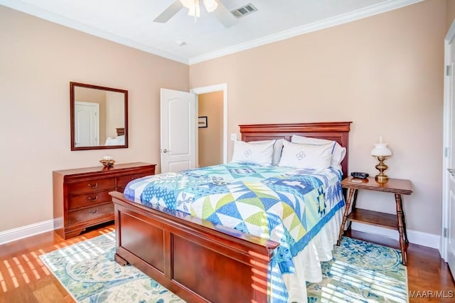 bedroom featuring wood-type flooring, ceiling fan, and crown molding