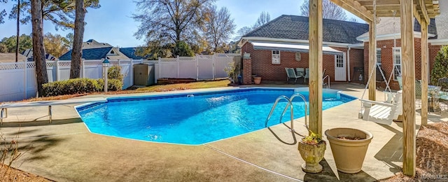 view of pool featuring a patio