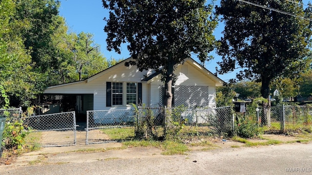 view of front of house with a carport