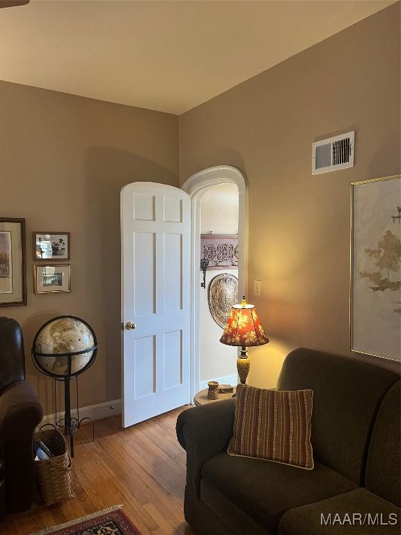 living room with light hardwood / wood-style flooring