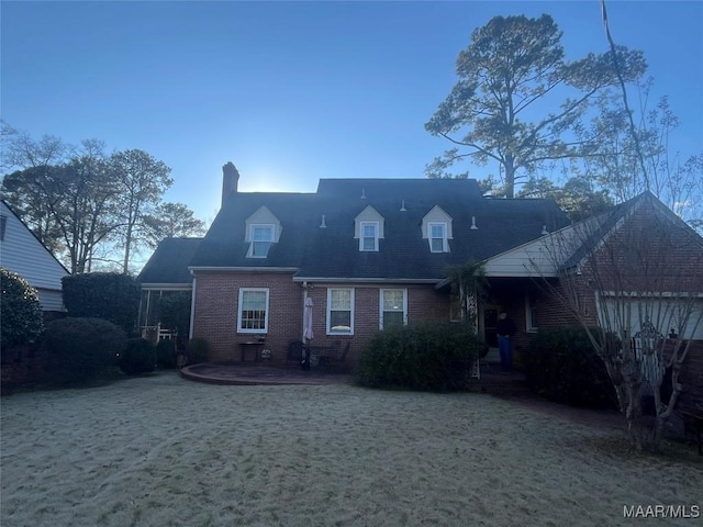 rear view of property with a patio