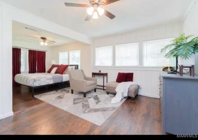 bedroom featuring dark hardwood / wood-style floors and ceiling fan