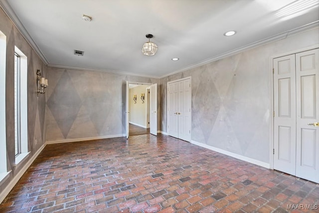 spare room with ornamental molding