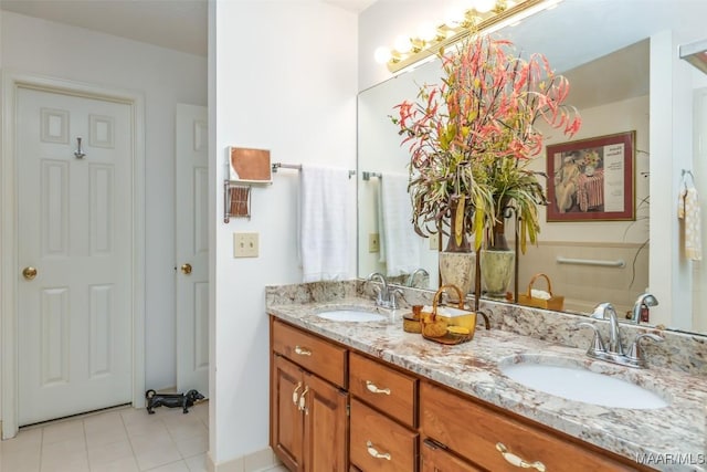 bathroom featuring tile patterned floors and vanity