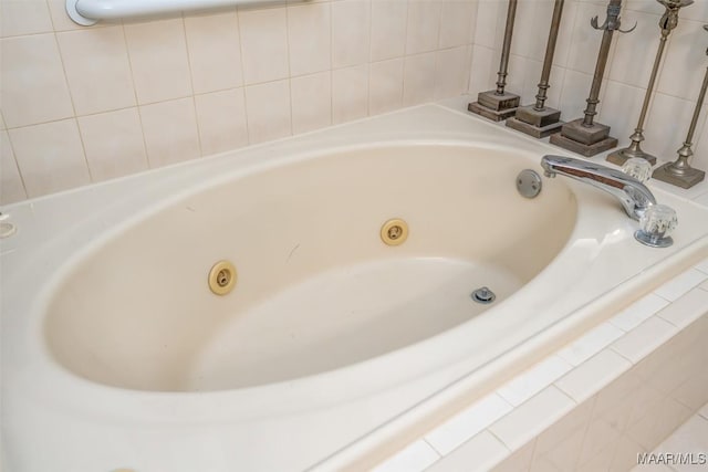 bathroom featuring a relaxing tiled tub