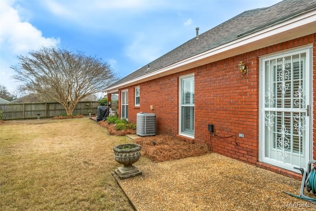 view of yard with central AC unit