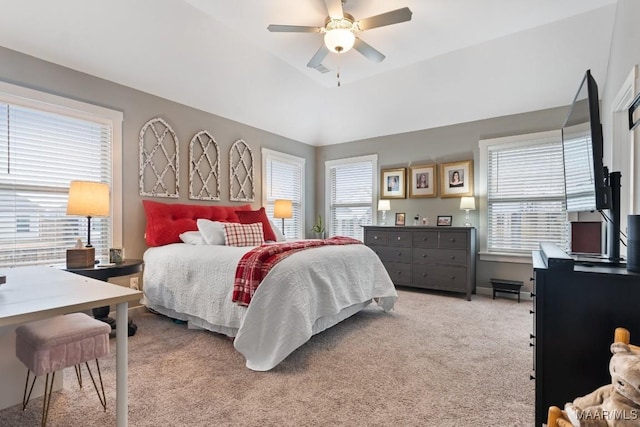 carpeted bedroom featuring ceiling fan and lofted ceiling