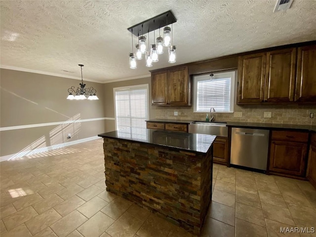 kitchen featuring dishwasher, sink, hanging light fixtures, and a chandelier