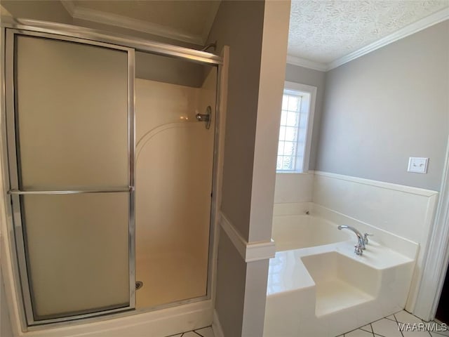 bathroom featuring a textured ceiling, tile patterned floors, independent shower and bath, and crown molding