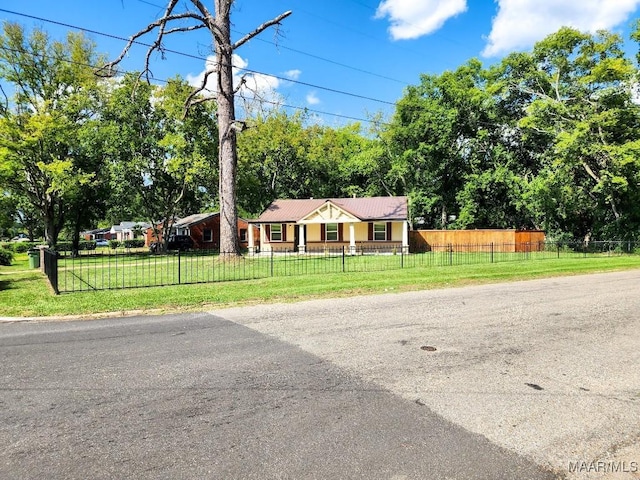 single story home with a front yard