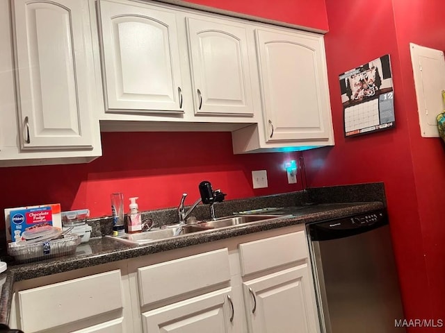 kitchen with dishwasher, white cabinetry, and sink