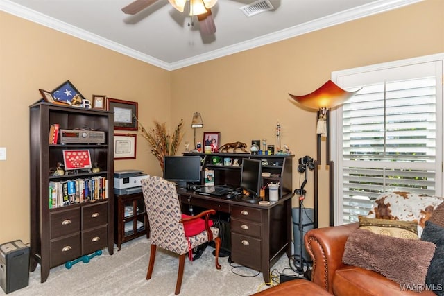 carpeted office space with ceiling fan and crown molding