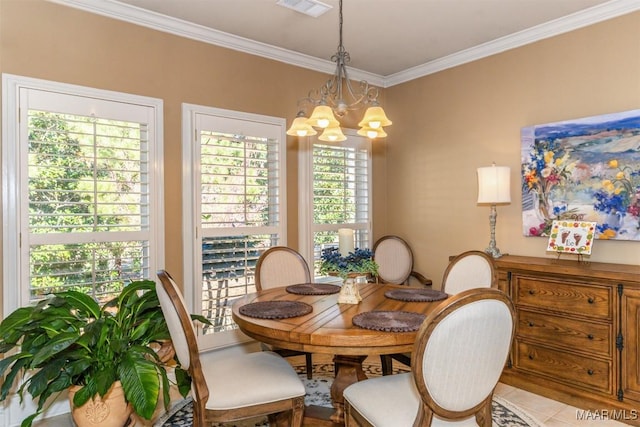 tiled dining space with crown molding and a chandelier