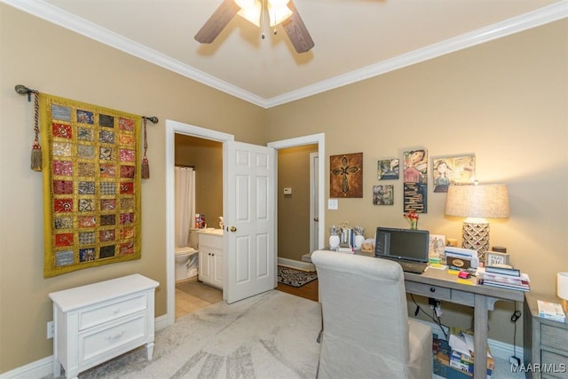 home office featuring light carpet, ornamental molding, and ceiling fan