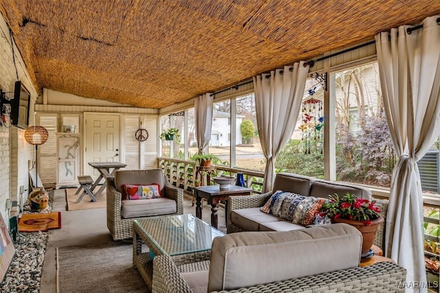 sunroom with an outdoor hangout area