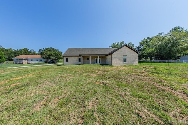 view of front of home featuring a front lawn