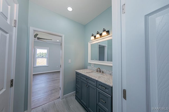 bathroom with vanity and ceiling fan