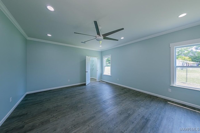 empty room with ceiling fan, crown molding, and dark hardwood / wood-style floors