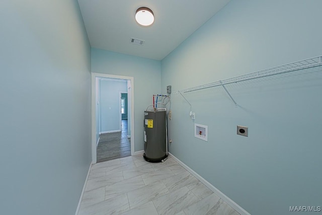 laundry area with water heater, hookup for a washing machine, and electric dryer hookup