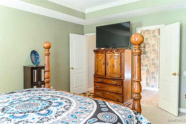 bedroom with light tile patterned floors, crown molding, and a textured ceiling