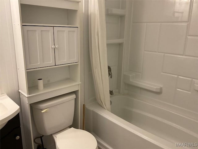 full bathroom with shower / tub combo, vanity, and toilet