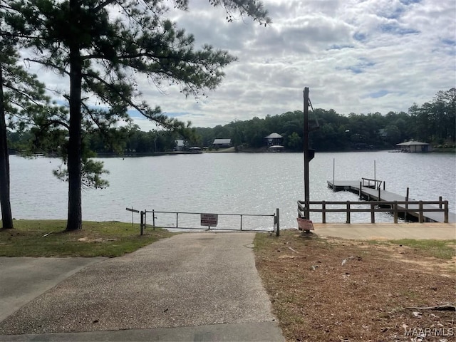 view of dock with a water view