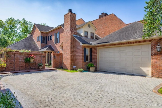 front facade with a garage