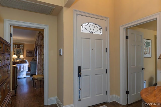 foyer with dark wood-type flooring