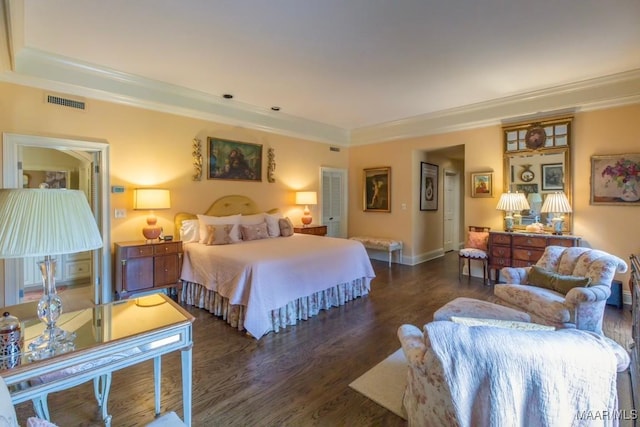 bedroom with dark wood-type flooring and ornamental molding