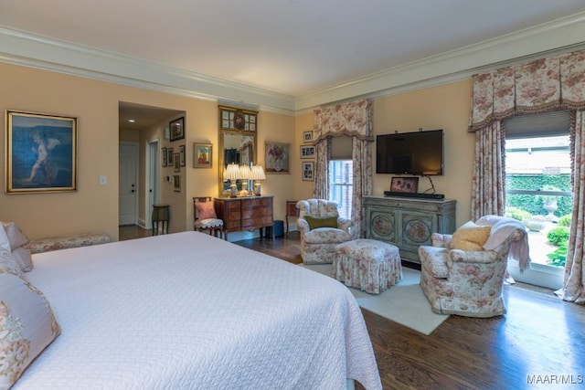 bedroom with wood-type flooring and ornamental molding