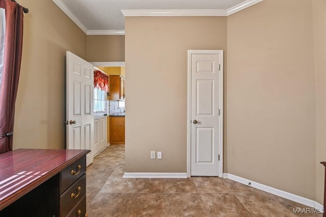 unfurnished office featuring a textured ceiling and ornamental molding