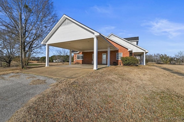 exterior space with a carport