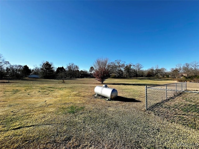 view of yard with a rural view