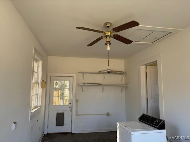 washroom featuring ceiling fan and washer / dryer