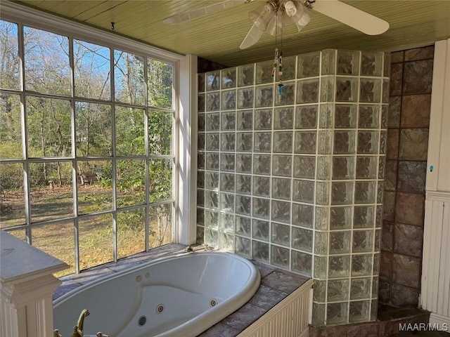 bathroom featuring tiled tub and wood ceiling