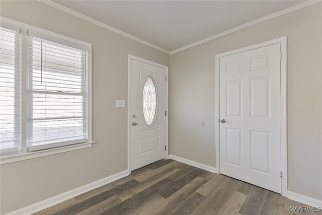 foyer featuring baseboards, dark wood-style flooring, and crown molding