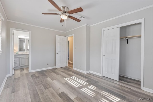 unfurnished bedroom with light wood-type flooring, baseboards, visible vents, and ornamental molding