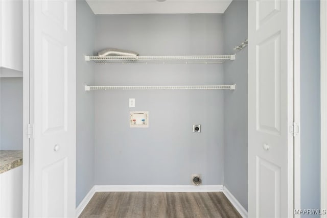 laundry room featuring electric dryer hookup, hardwood / wood-style flooring, and hookup for a washing machine