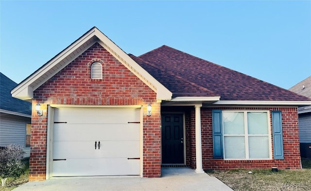 view of front of property featuring a garage