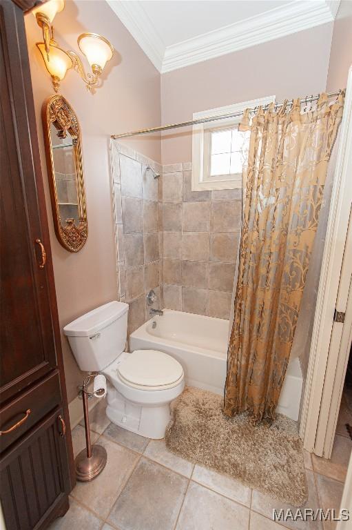 bathroom with toilet, ornamental molding, and shower / tub combo