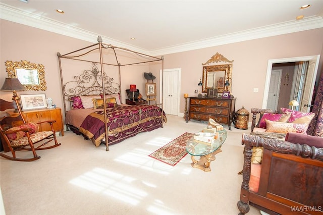 bedroom with carpet flooring and crown molding