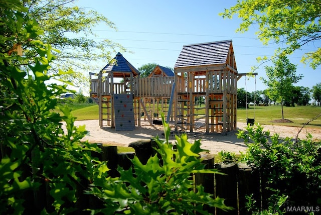 view of play area with a yard