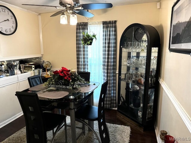 dining room featuring ceiling fan