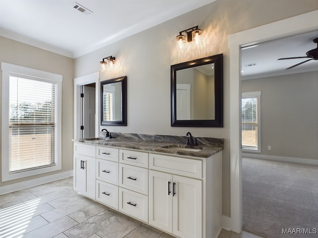 bathroom featuring vanity, ceiling fan, and ornamental molding