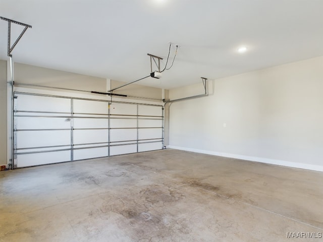 garage featuring a garage door opener