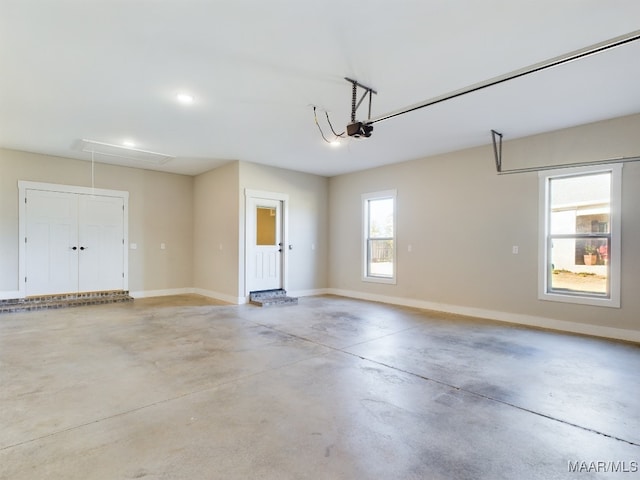 garage featuring a garage door opener