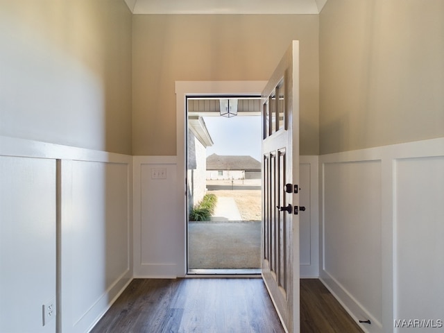 doorway featuring dark hardwood / wood-style floors